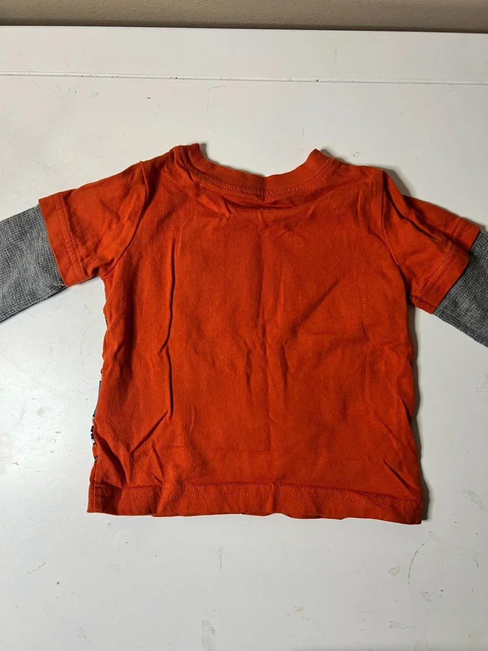 Carter's Deep Orange Baby Tee with Dino’s Hidden Dino Fun Thermal Sleeve 6M